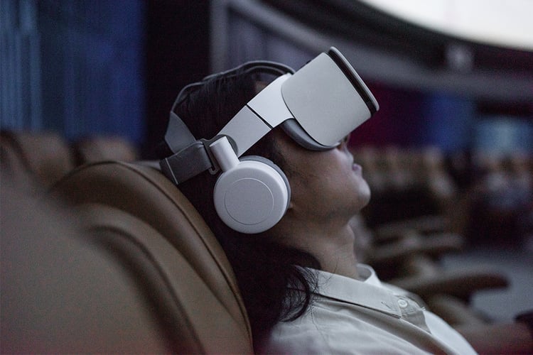 Women experiencing VR in a chair